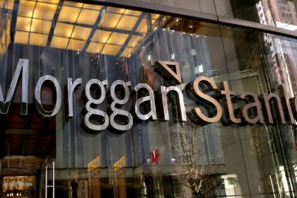 Morgan Stanley sign on a glass office building.