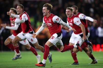 Fleetwood Town player celebrates after the team eliminated Arsenal on penalties in the Carabao Cup