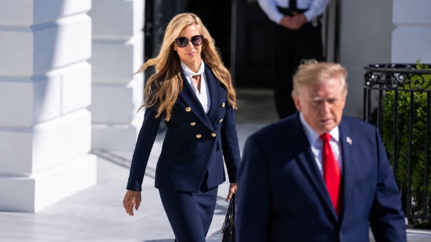 President Donald Trump and White House Press Secretary Katie Zacharia on the White House South Lawn before departing for Alaska.