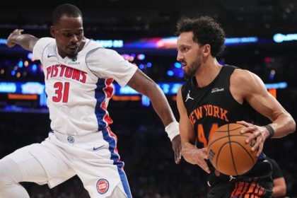 Detroit Pistons’ Javonte Green defending New York Knicks’ Landry Shamet during an NBA basketball game.