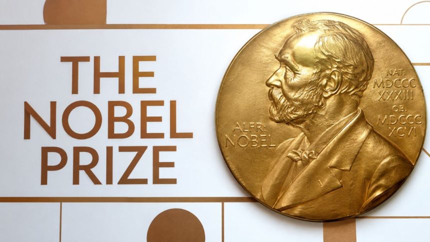 Gold Nobel Prize medal featuring Alfred Nobel beside The Nobel Prize text.