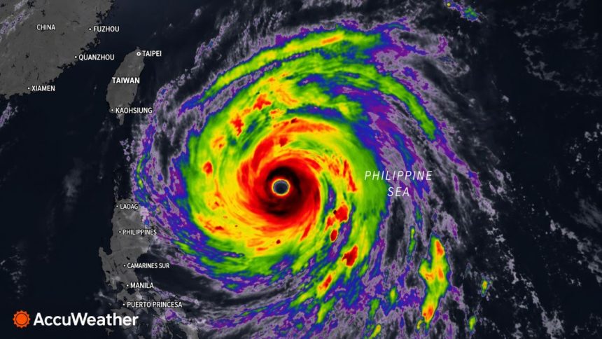 Satellite image of Typhoon Champi with a defined eye and intense storm bands over the Philippine Sea.